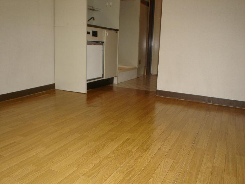 Living and room. Is the flooring of shiny