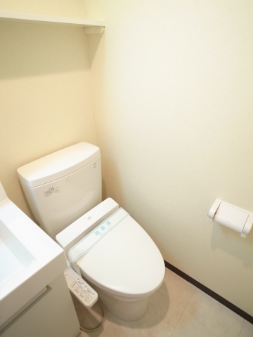 Toilet. It is a photograph of the same building another room