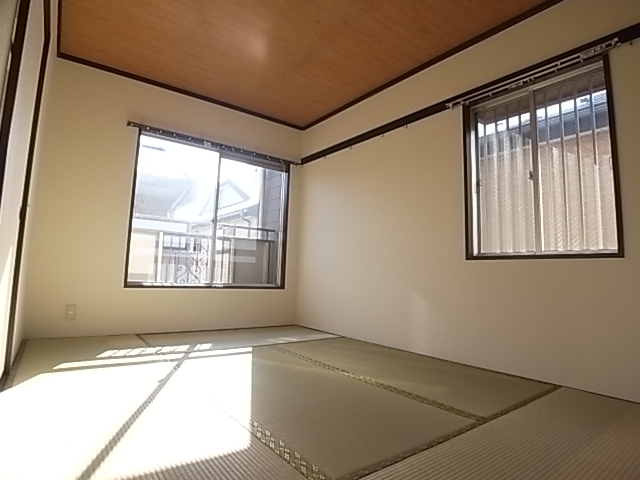 Other room space. Because it is a corner room, It is many window.