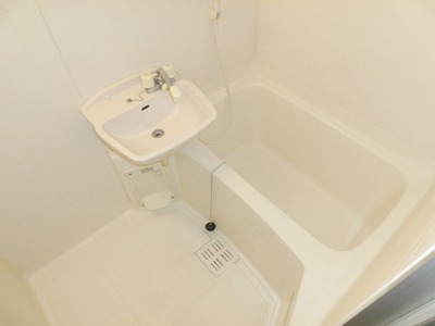 Bath. Together with bathroom and wash basin