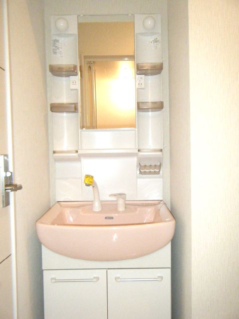 Washroom. It is a photograph of the other room.