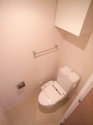 Toilet. It is a photograph of the same building another room