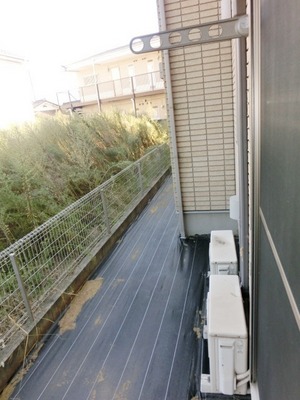 Balcony. Jose and laundry outside