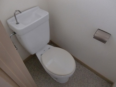 Toilet. It has a window in the toilet