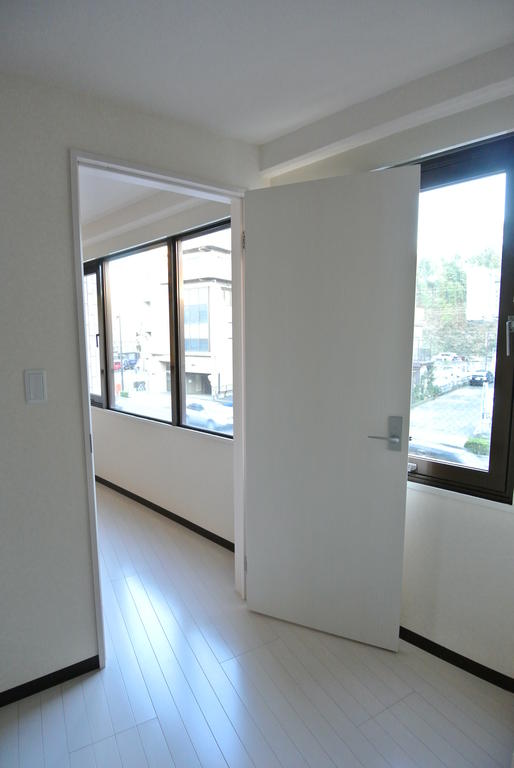 Living and room. It is a large floor plan of the window.