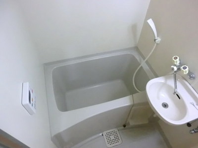 Bath. It is a bathroom with wash basin