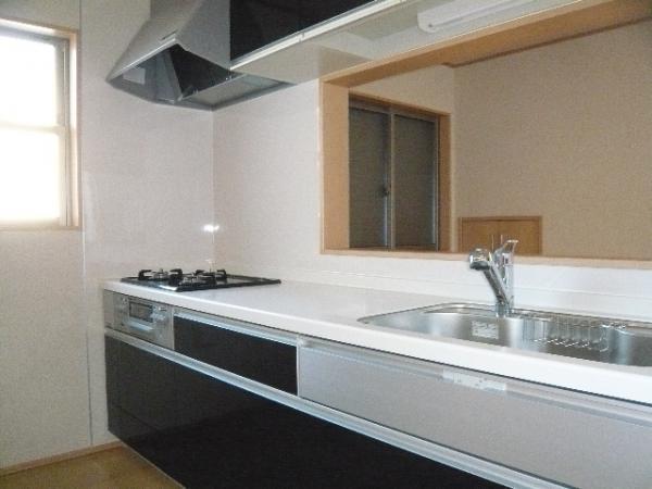 Kitchen. Worry face-to-face kitchen person with small children.