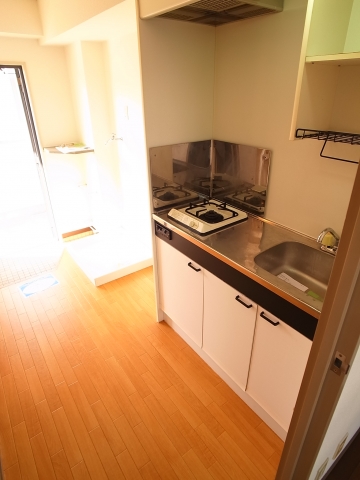 Kitchen. It is a photograph of the same building another room (305 Room No.)