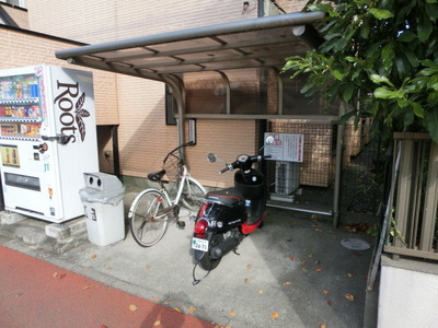 Other common areas. Bicycle parking lot with a roof