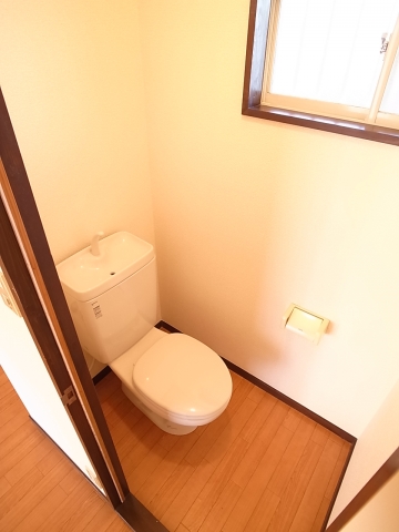 Toilet. It is a photograph of the same building another room