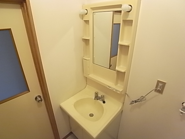 Washroom. With separate wash basin. .