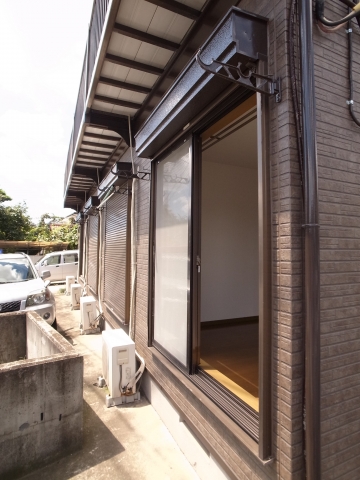 Balcony. The first floor is a sweep-type window.