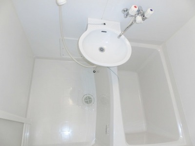 Bath. Together with bathroom and wash basin