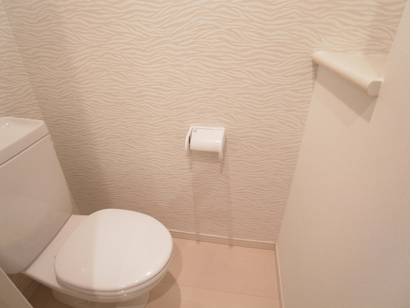 Toilet. Wallpaper is the zebra