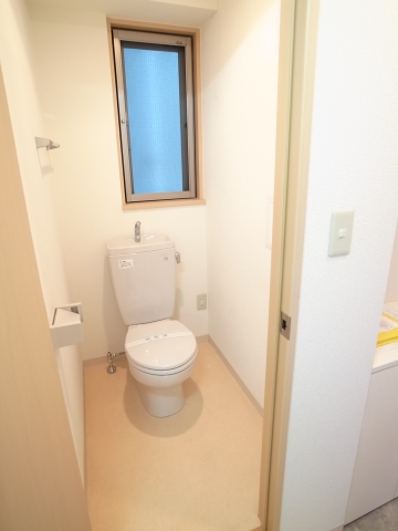 Toilet. It is a photograph of the same building another room