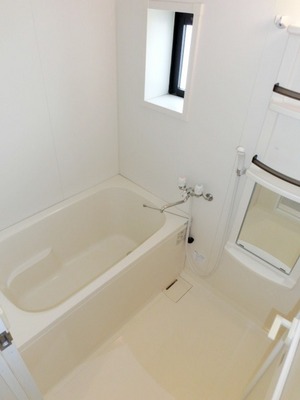 Bath. Spacious bathroom with a window