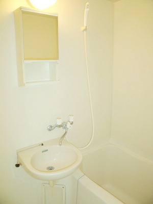 Washroom. It is a bathroom with wash basin