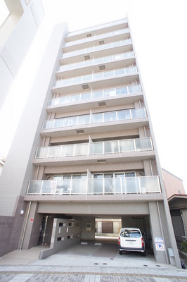 Building appearance. The first floor is a parking and bicycle parking