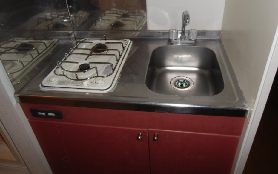 Kitchen. It is a gas stove