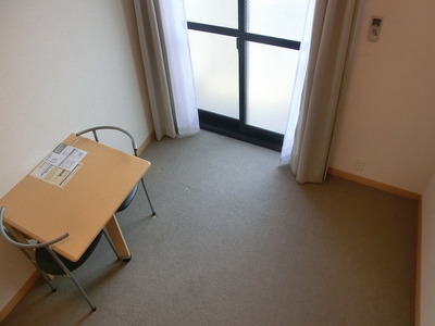 Other room space. The window is large, bright room