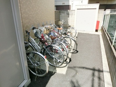 Parking lot. It is a bicycle parking space.