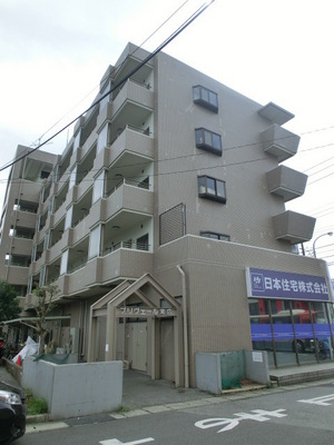 Building appearance. Outer wall tiled apartment