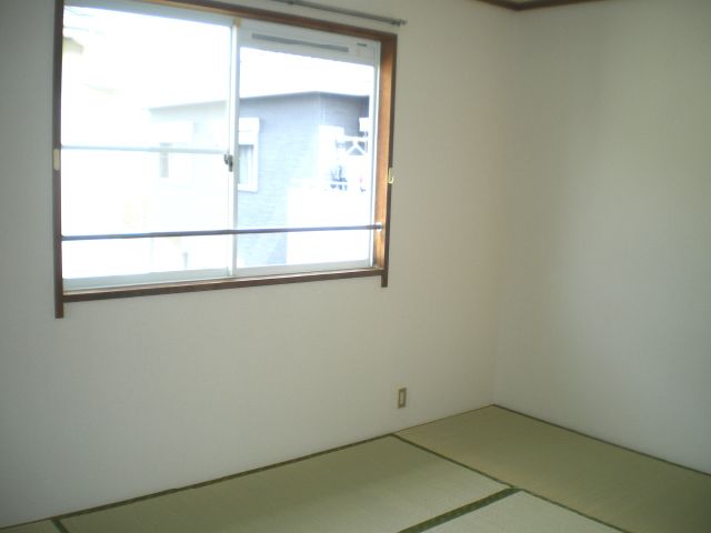 Living and room. There is also a window to the Japanese-style room