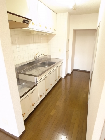 Kitchen. It is a photograph of the same building another room (110 Room No.)