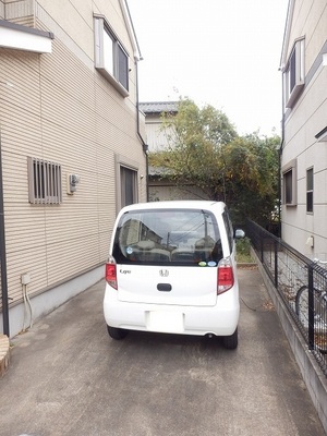 Parking lot. High roof vehicles can also be parked flat parking lot with two