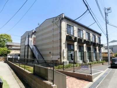 Building appearance. It is a quiet residential area.