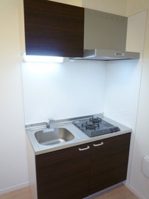 Kitchen. 2-neck is with a stove