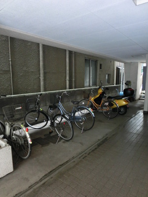 Parking lot. It is a bicycle parking space.