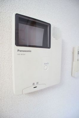 Security. It is a monitor with intercom of safely in the living alone.