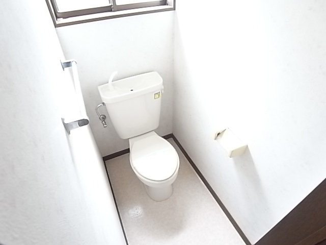 Toilet. There are also ventilation window in the toilet.