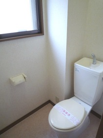 Toilet. There is 24-hour reception dial of residence.