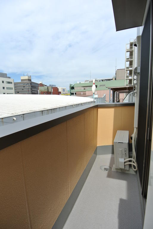 Balcony. Per yang good wall is tiled specification.