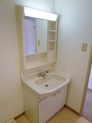 Washroom. Bright is a wash basin.