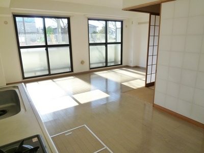 Living and room. Popularity of wide living room is warm sunshine from large windows drenched.