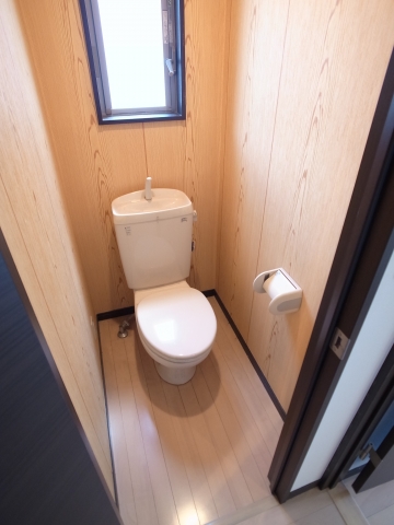 Toilet. It is a bright toilet of with small window!