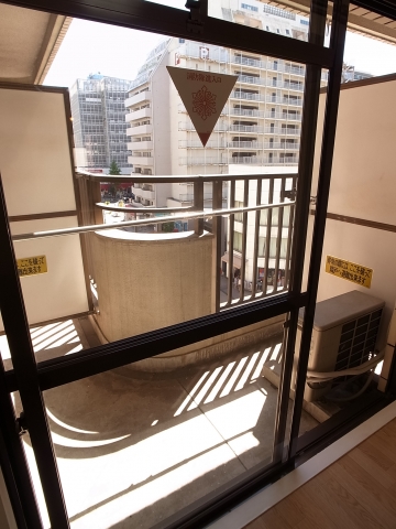 Balcony. It is a photograph of the same building another room