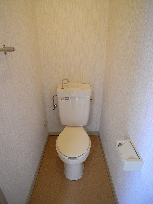 Toilet. It is separate from the bath