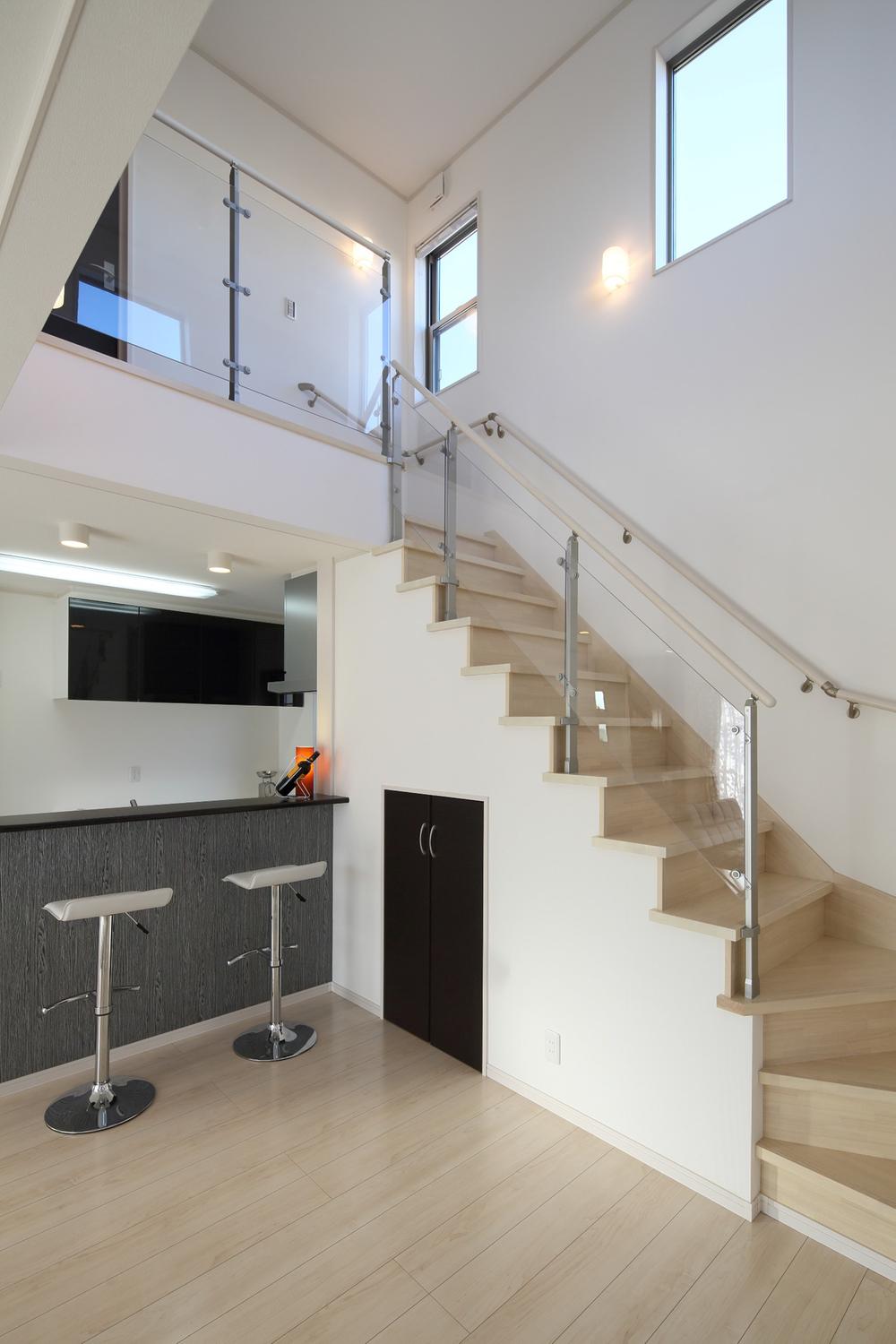 Stair handrail is creating the open space.