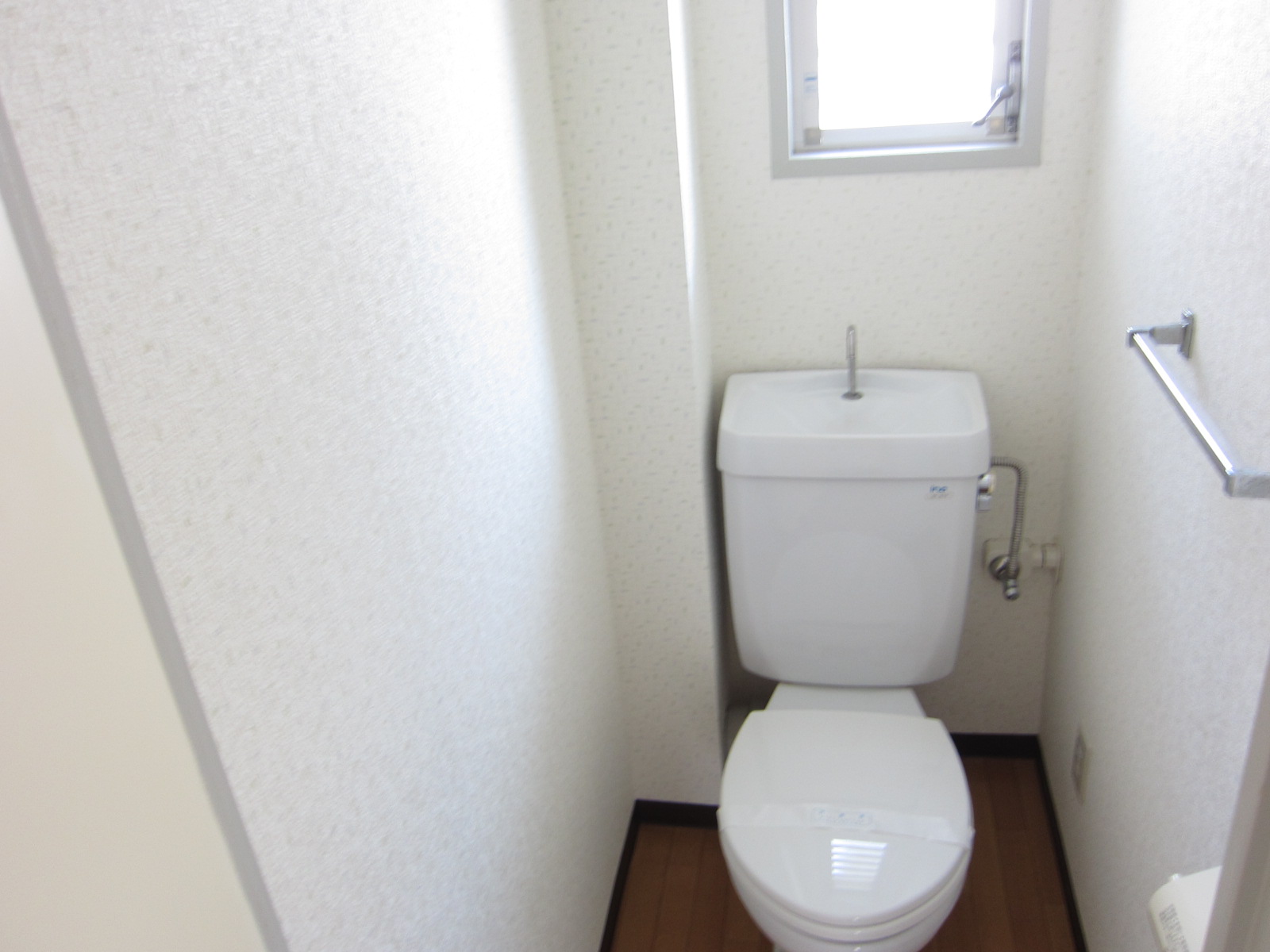 Toilet. Pat ventilation because there is a window!