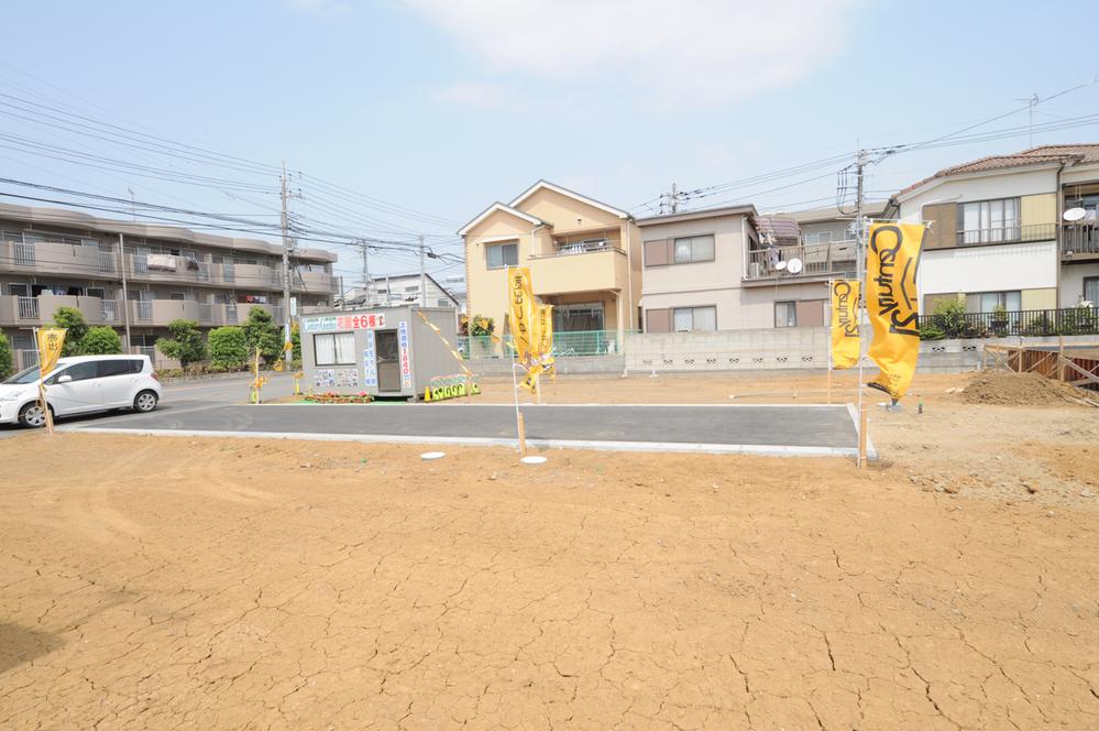 Local photos, including front road. Located on a hill, Sidewalk with readjustment land,