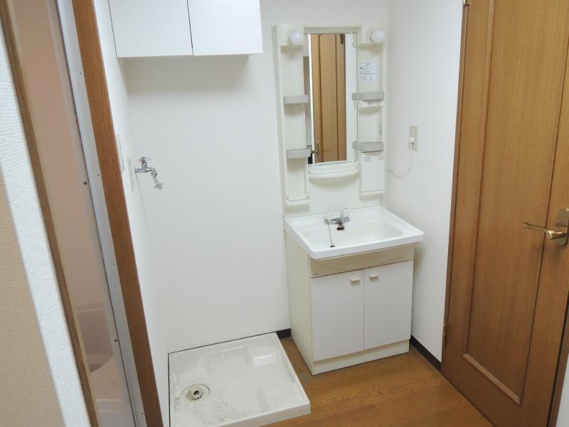 Washroom. With separate wash basin ・ Peace of mind Indoor Laundry Area