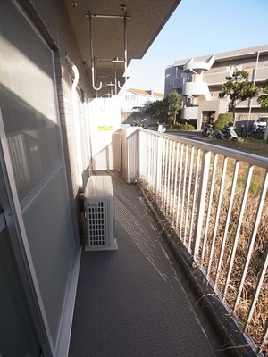 Balcony. Sunny balcony because there is no higher in the front building.