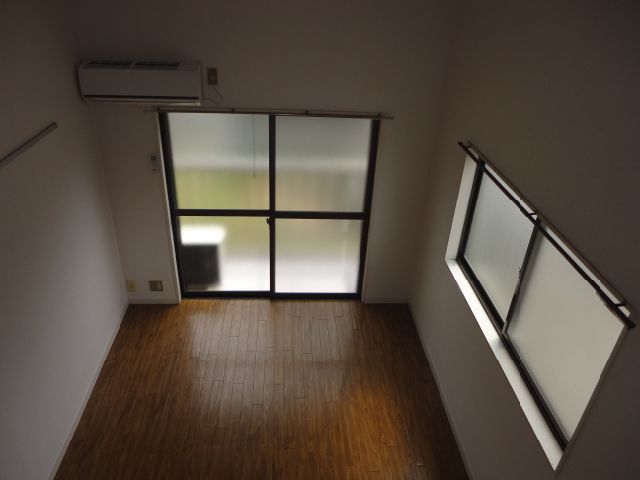 Living and room. This image viewed from loft