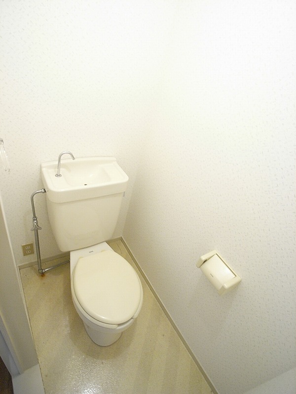 Toilet. It has a window in the bathroom
