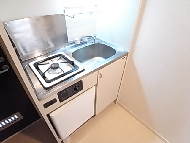 Kitchen. 1 lot gas stoves with a kitchen is happy to clean.