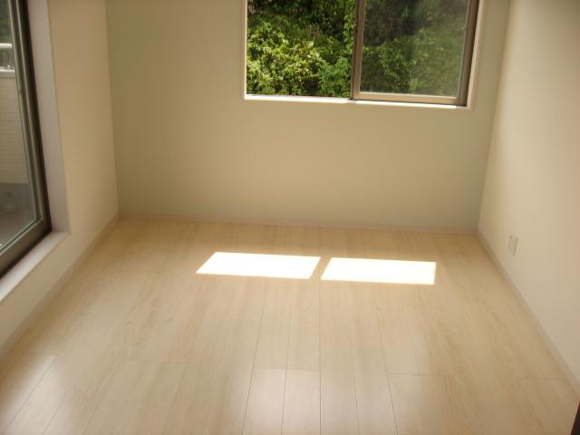 Non-living room. Sunshine filtering through foliage is plug soft space.